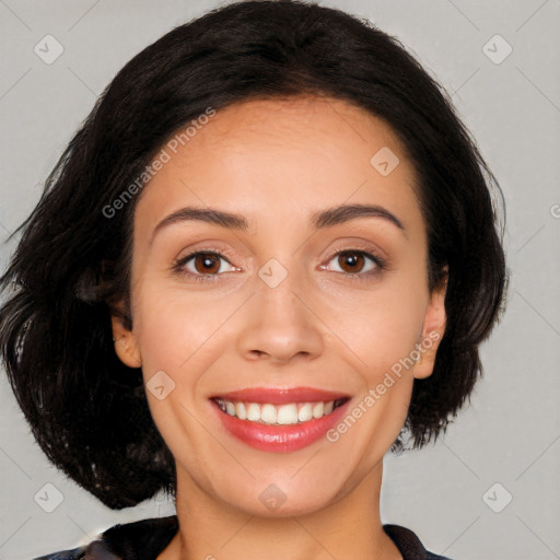 Joyful white young-adult female with medium  black hair and brown eyes