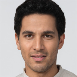 Neutral white young-adult male with short  black hair and brown eyes