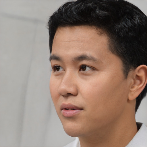 Neutral asian young-adult male with short  black hair and brown eyes