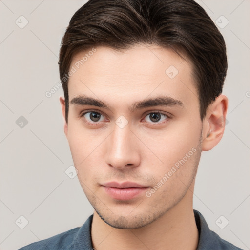 Neutral white young-adult male with short  brown hair and brown eyes