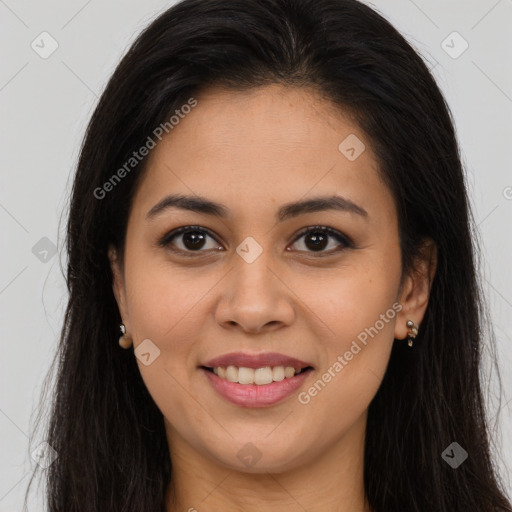 Joyful latino young-adult female with long  brown hair and brown eyes