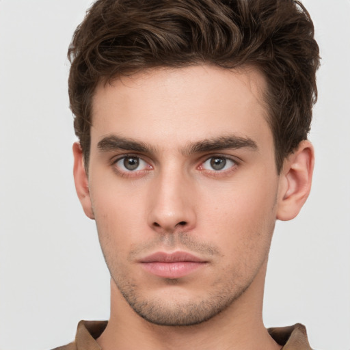 Neutral white young-adult male with short  brown hair and brown eyes