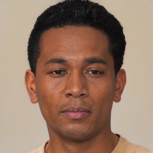 Neutral black young-adult male with short  black hair and brown eyes