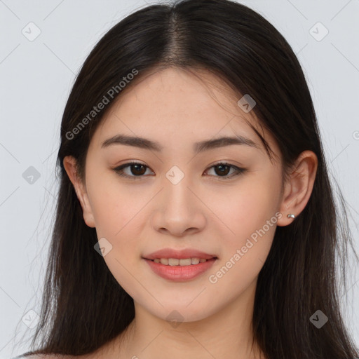 Joyful asian young-adult female with long  brown hair and brown eyes