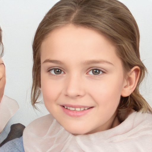 Joyful white child female with medium  brown hair and brown eyes