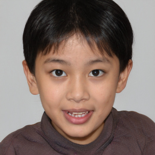 Joyful white child female with short  brown hair and brown eyes
