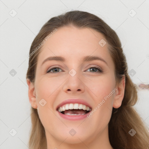 Joyful white young-adult female with long  brown hair and grey eyes