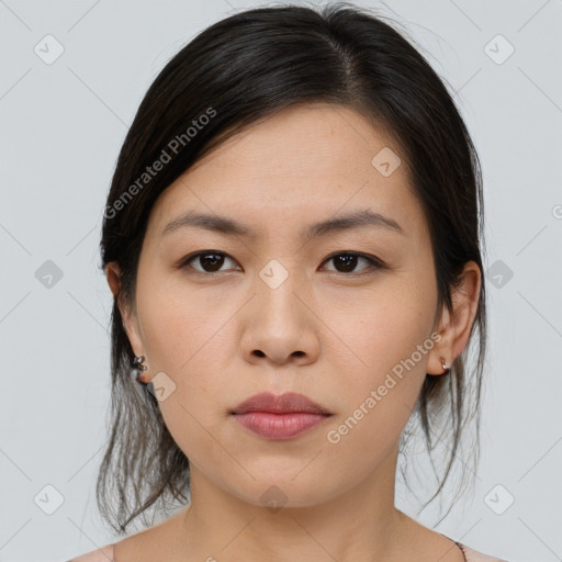 Neutral asian young-adult female with medium  brown hair and brown eyes