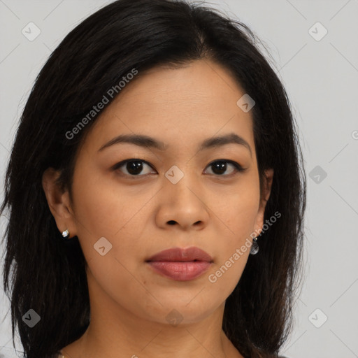 Joyful asian young-adult female with long  brown hair and brown eyes