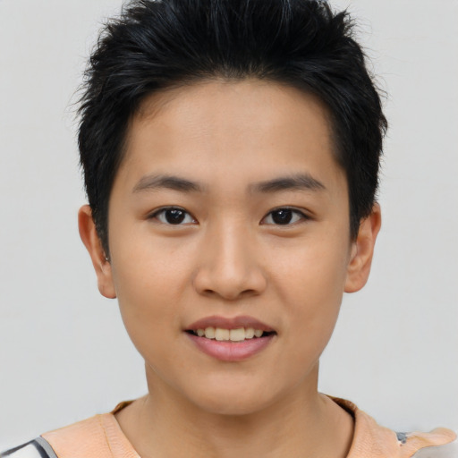 Joyful asian young-adult female with short  brown hair and brown eyes