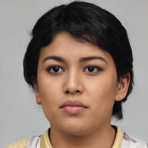 Neutral latino young-adult female with medium  black hair and brown eyes