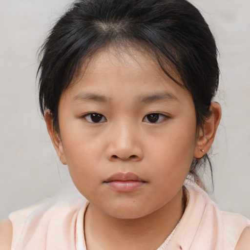 Neutral asian child female with medium  brown hair and brown eyes
