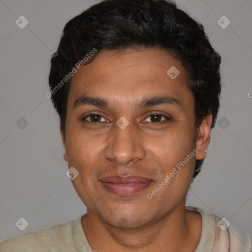 Joyful latino young-adult male with short  black hair and brown eyes