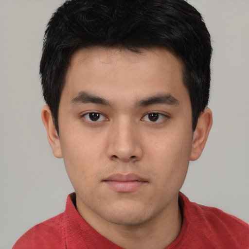 Neutral asian young-adult male with short  brown hair and brown eyes