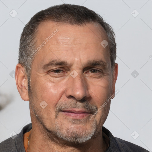 Joyful white middle-aged male with short  brown hair and brown eyes