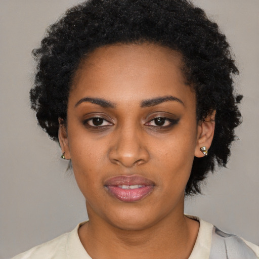 Neutral black young-adult female with short  black hair and brown eyes