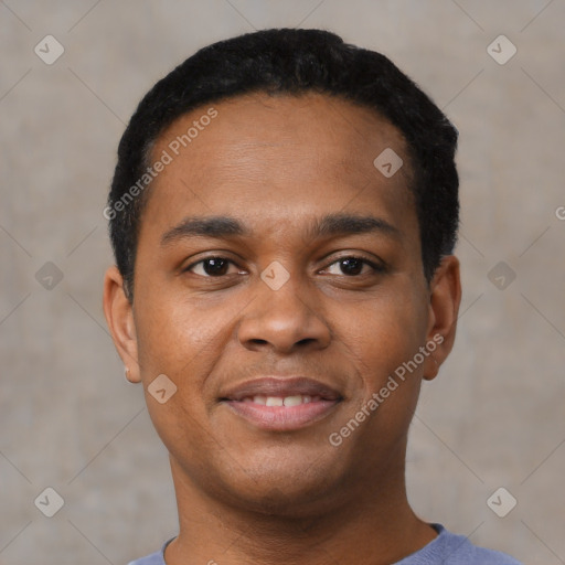 Joyful black young-adult male with short  black hair and brown eyes