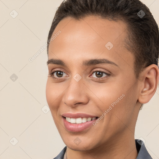 Joyful white young-adult female with short  brown hair and brown eyes