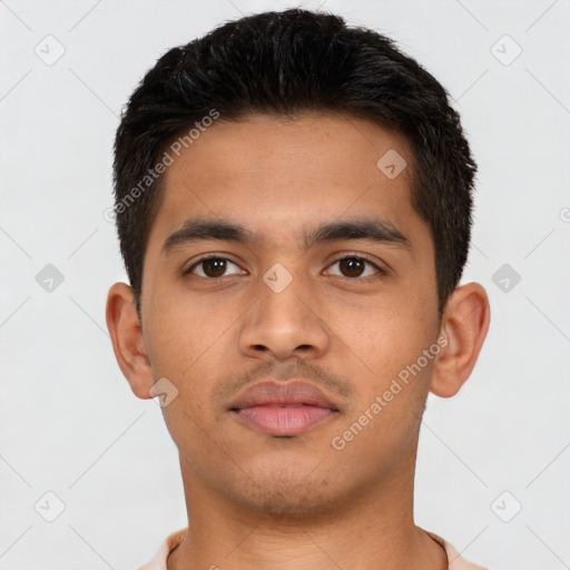 Neutral latino young-adult male with short  black hair and brown eyes