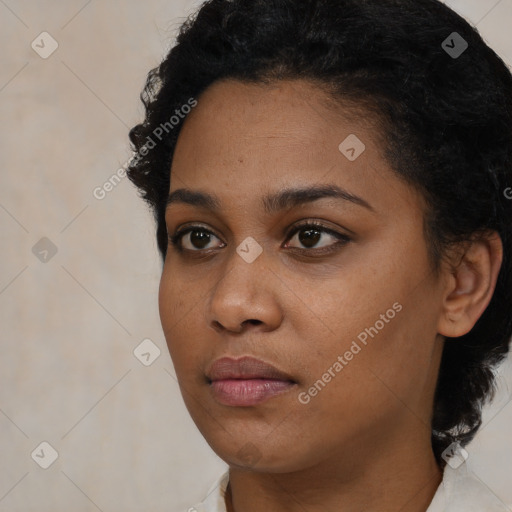 Neutral black young-adult female with short  black hair and brown eyes