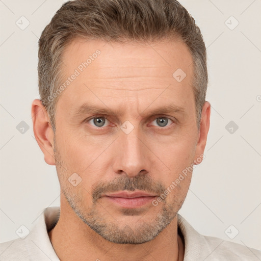 Neutral white adult male with short  brown hair and brown eyes