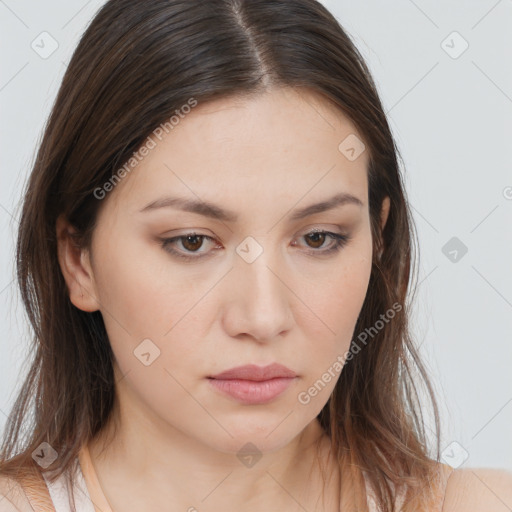 Neutral white young-adult female with long  brown hair and brown eyes