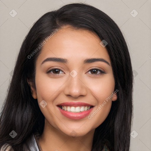 Joyful latino young-adult female with long  black hair and brown eyes