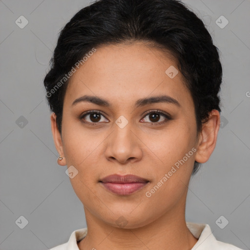 Joyful latino young-adult female with short  brown hair and brown eyes