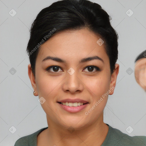 Joyful asian young-adult female with short  black hair and brown eyes