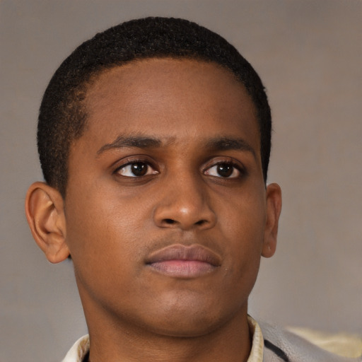 Neutral black young-adult male with short  brown hair and brown eyes