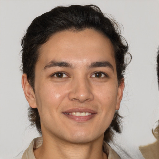 Joyful white young-adult male with medium  brown hair and brown eyes