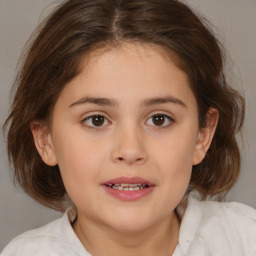 Joyful white child female with medium  brown hair and brown eyes