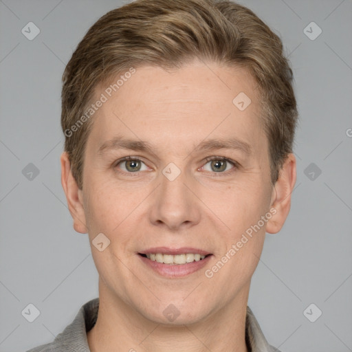 Joyful white adult male with short  brown hair and grey eyes