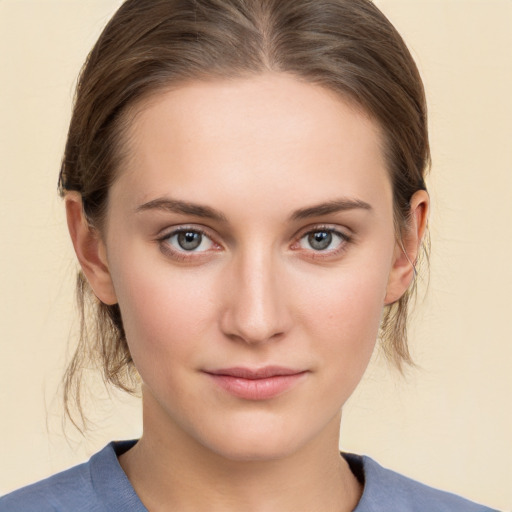 Neutral white young-adult female with medium  brown hair and grey eyes