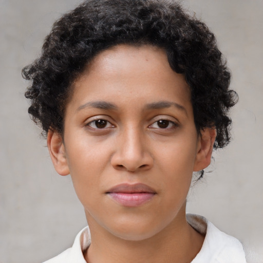 Neutral latino young-adult female with short  brown hair and brown eyes