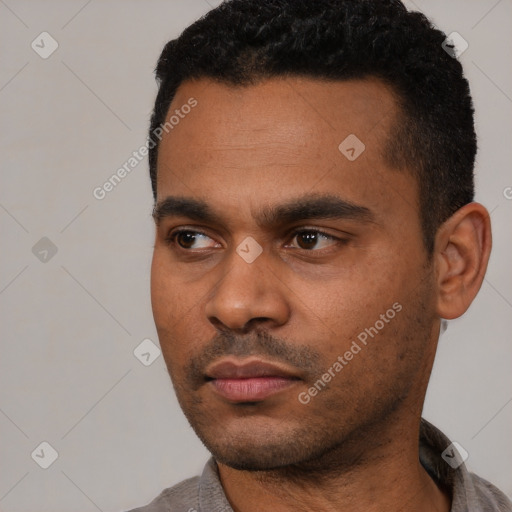 Neutral latino young-adult male with short  black hair and brown eyes