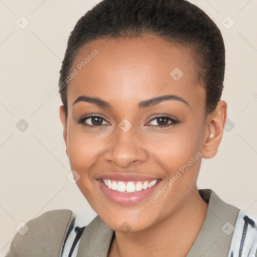 Joyful latino young-adult female with short  brown hair and brown eyes