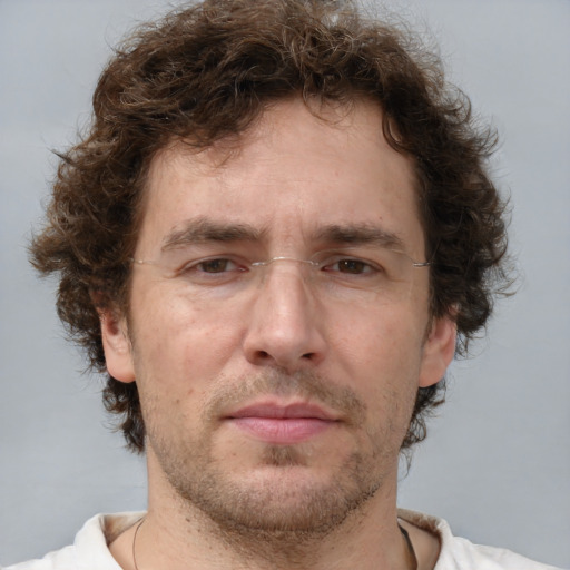 Neutral white adult male with short  brown hair and brown eyes