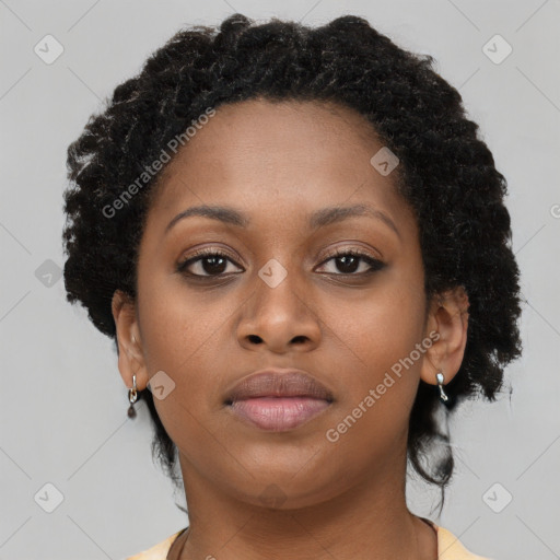 Neutral black young-adult female with short  brown hair and brown eyes