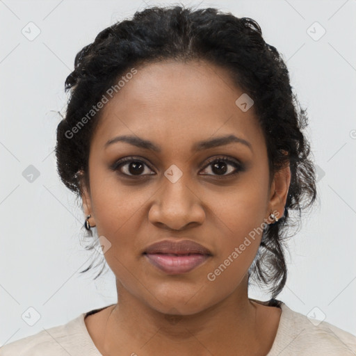 Joyful black young-adult female with medium  black hair and brown eyes