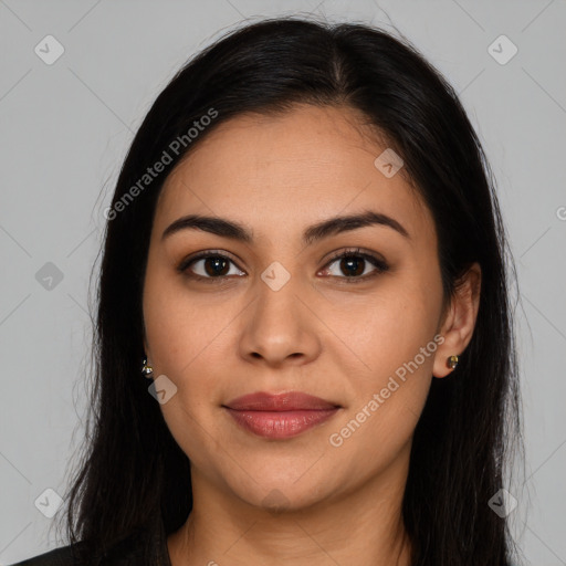 Joyful latino young-adult female with long  brown hair and brown eyes