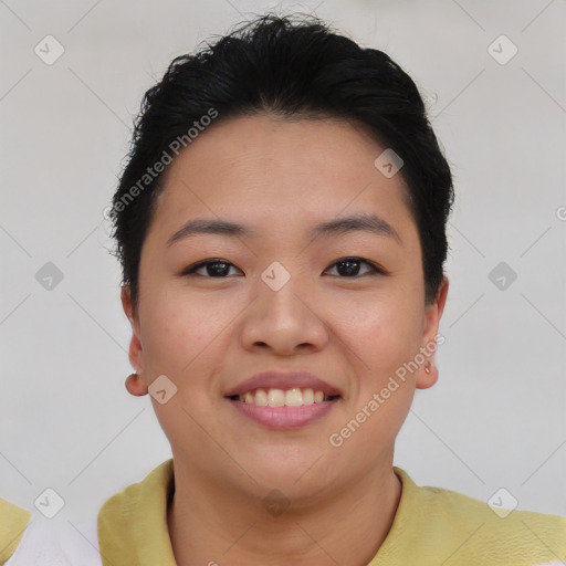 Joyful asian young-adult female with short  brown hair and brown eyes