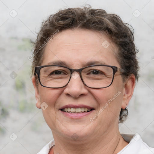 Joyful white adult female with short  brown hair and brown eyes