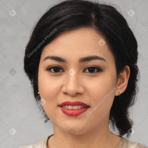 Joyful asian young-adult female with medium  black hair and brown eyes