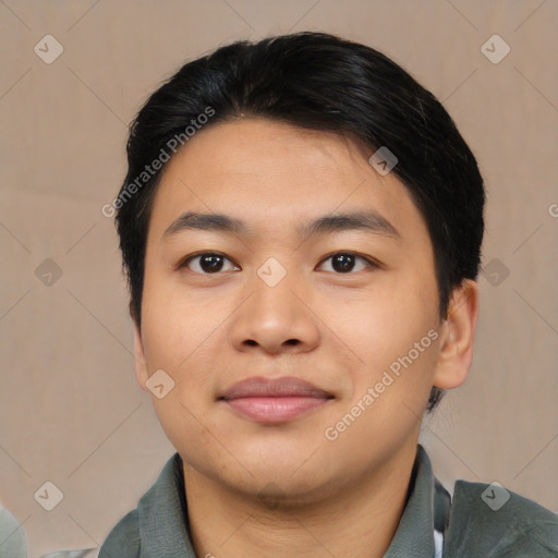 Joyful asian young-adult male with short  black hair and brown eyes