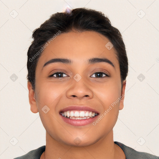 Joyful latino young-adult female with short  black hair and brown eyes