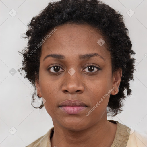 Neutral black young-adult female with short  brown hair and brown eyes