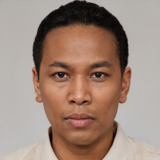 Neutral black young-adult male with short  black hair and brown eyes