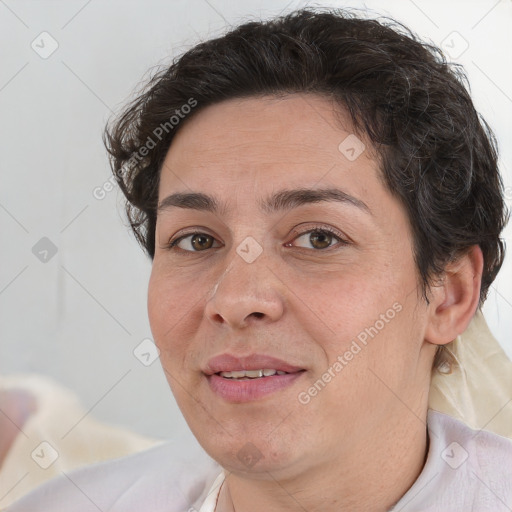 Joyful white adult female with short  brown hair and brown eyes