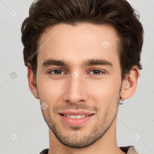 Joyful white young-adult male with short  brown hair and brown eyes